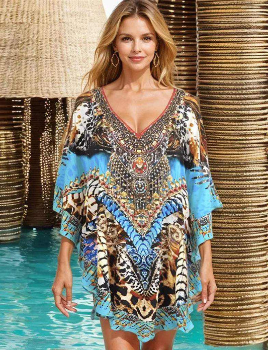 Silk Embellished Butterfly Top with handsewn beadwork, V-neck, butterfly sleeves, and colorful bold design.