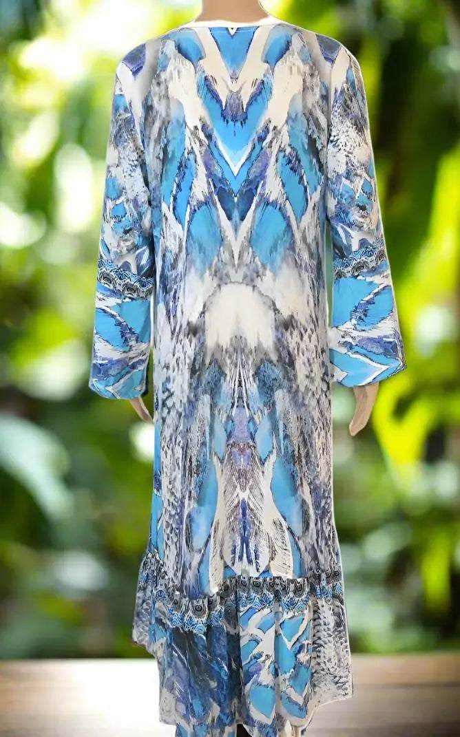 Back view of blue Silk Hi-Low Frill Dress with long sleeves and abstract pattern