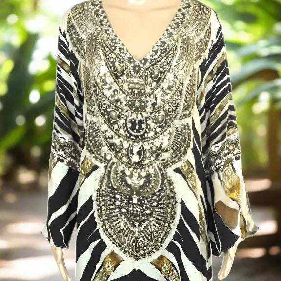 Silk Hi-Low Frill Dress with animal print, v-neck, long split sleeves, and handsewn gold and silver beadwork embellishments