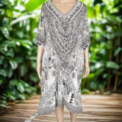 34 sleeve silk embellished knee-length dress with V-neck and intricate beadwork in gold and silver