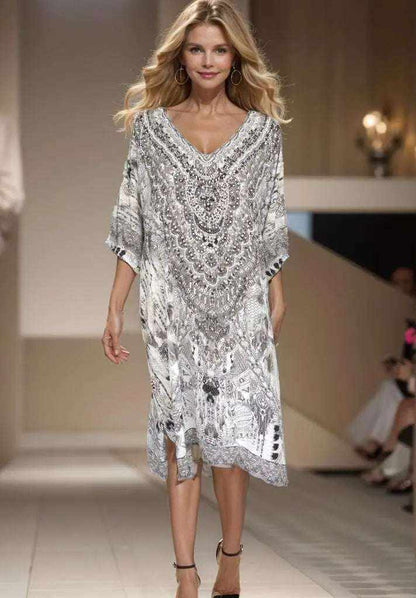 34 sleeve silk embellished dress with V-neck and intricate beadwork, knee-length design