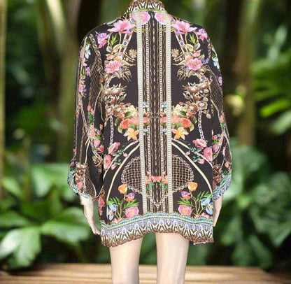 Back view of black Silk Embellished Shirt-Capri with floral and geometric patterns by Fashion Spectrum