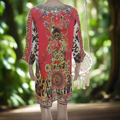 Garden Delight red silk embellished tunic dress with beadwork and animal print design seen from the back