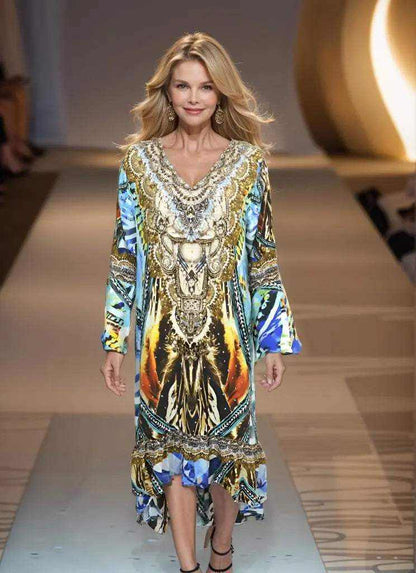 Woman wearing multi-colored Silk Hi-Low Frill Dress with gold and silver beadwork walking on runway