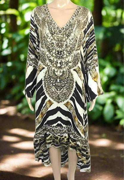 Silk Hi-Low Frill Dress with animal print, handsewn beadwork, v-neck, long split sleeves, and frilled hi-low hemline