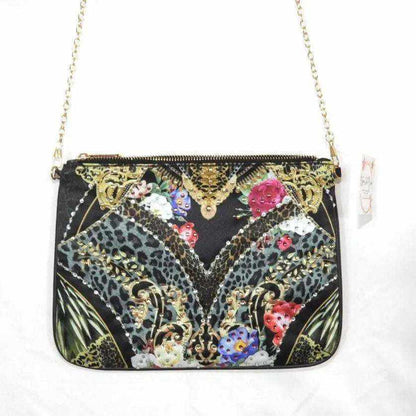 Embellished clutch bag with exotic floral and animal print, gold chain strap, and zipper enclosure by Kaftans that Bling