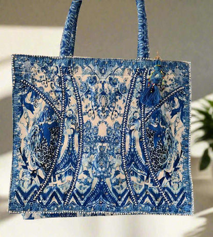 Large Embellished Tote Bag in blue and white with intricate digital print, padded handles, and zipper closure for secure storage.