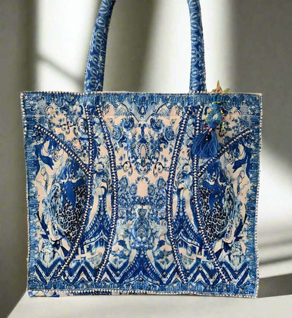 Large embellished tote bag with blue intricate digital print and padded handles