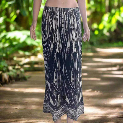 Saffron black palazzo pants with wide leg, lightweight silk fabric, and handsewn beadwork accents