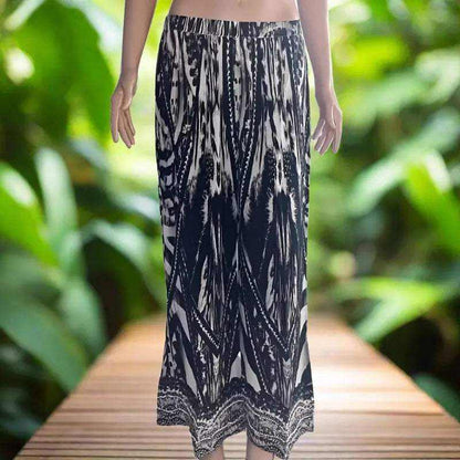 saffron black palazzo pants with wide leg and intricate beadwork on ankle hem in black and white pattern