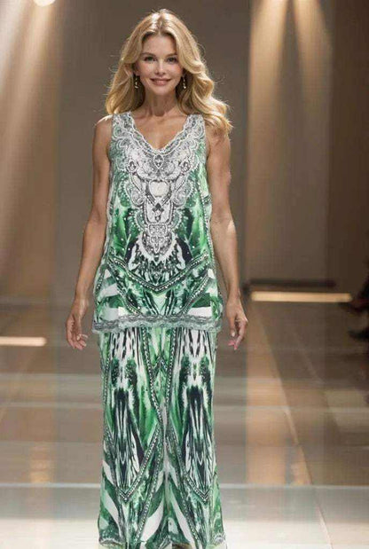 Saffron green silk palazzo pants with handsewn white and silver beadwork, elastic back, side pockets, and flat pleats in emerald, black, and white colors.