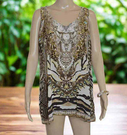 Cheetah silk embellished tank top with gold beadwork and animal print design on a mannequin