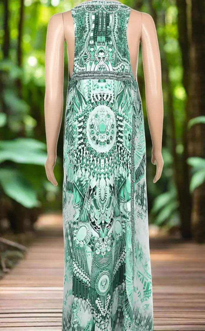 Back view of Amara Green Silk Maxi Dress with embellished racerback design displayed on mannequin in outdoor setting