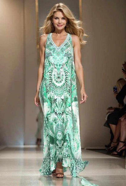 Model wearing Amara Green Silk Maxi Dress with embellished racerback and vibrant print on runway
