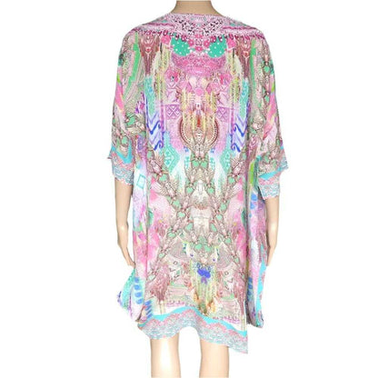 Back view of Zahara Silk Batwing Kaftan Top with colorful intricate patterns and batwing sleeves