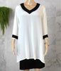Cream silk beaded tunic top with black beaded V-neck and 3/4 sleeves by Fashion Spectrum