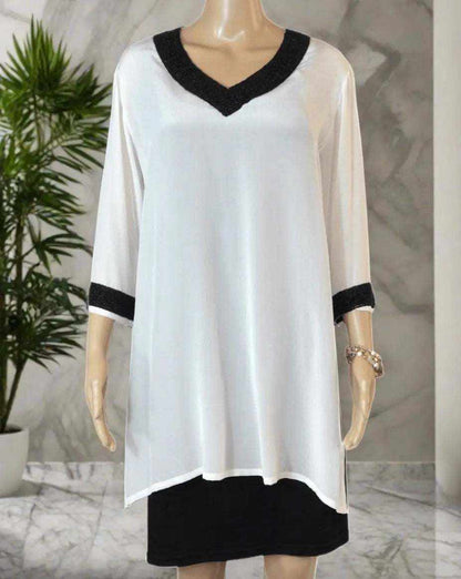 Cream Silk Beaded Tunic/Top with black beaded V-neck and 3/4 sleeves by Fashion Spectrum