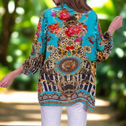 Garden Delight Silk embellished aqua animal print shirt with floral and intricate patterns by Fashion Spectrum