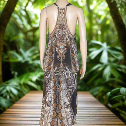 Silk T Back Embellished Camisole with snake print, handsewn beadwork, and T-back design on mannequin in nature background